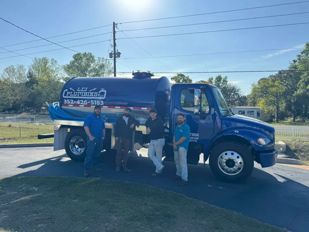LCI septic pumping truck and crew ready for a septic tank pump-out